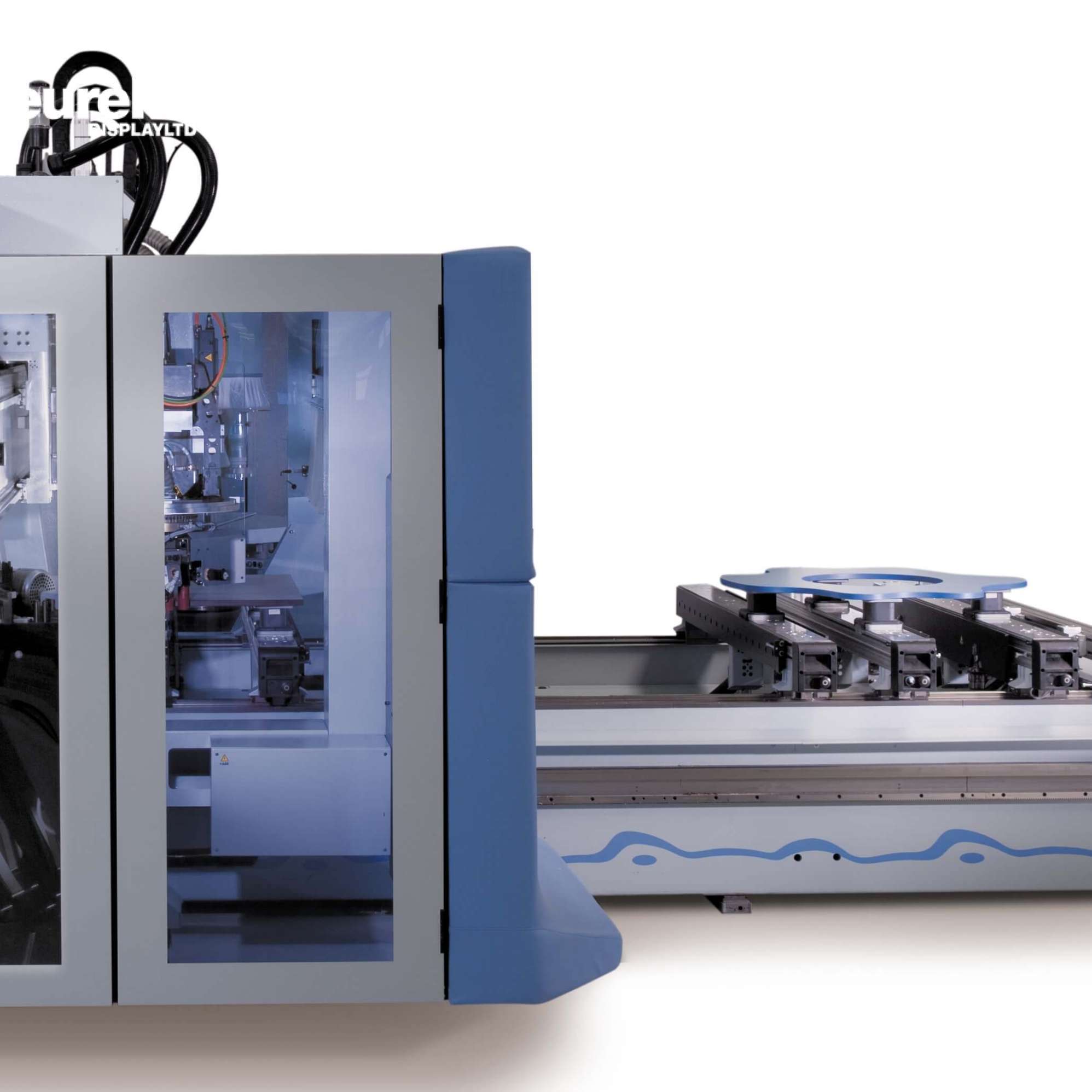 Member of eureka staff using the CNC edge banding machine